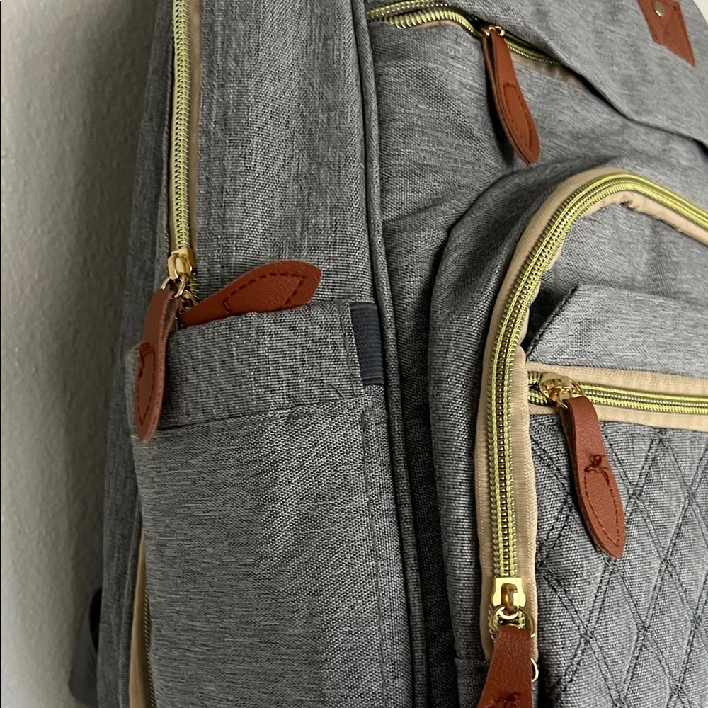 Gray Quilted Backpack with Brown Accents